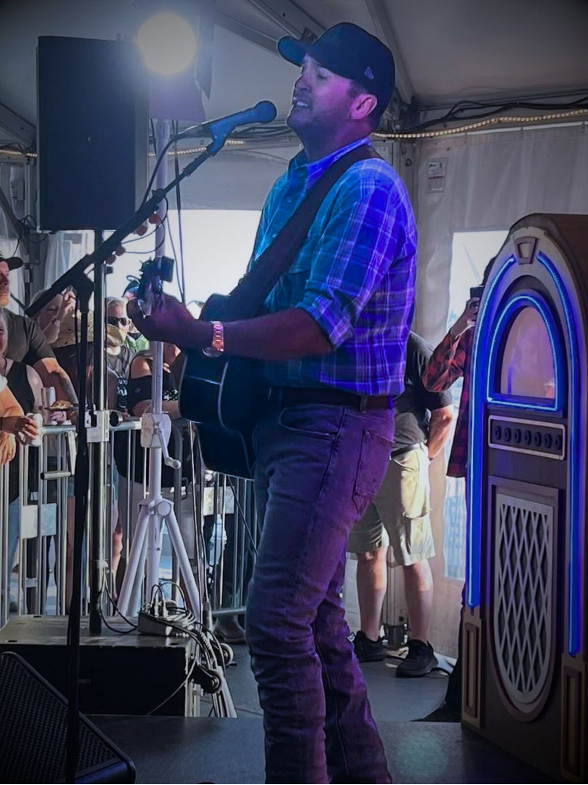 Luke Bryan performing at a private show aboard the Battleship New Jersey secured by Semper Secure