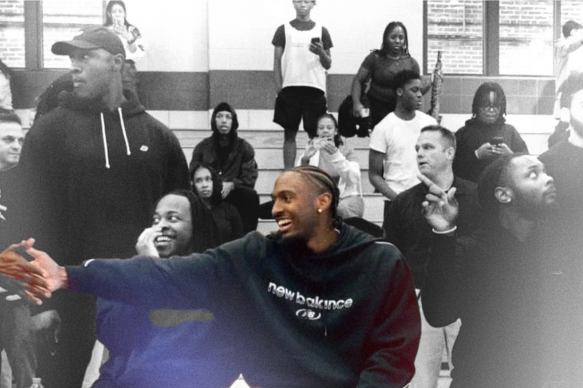 Philadelphia 76ers All-Star guard Tyrese Maxey greeting fans courtside at an event with Semper Secure protection