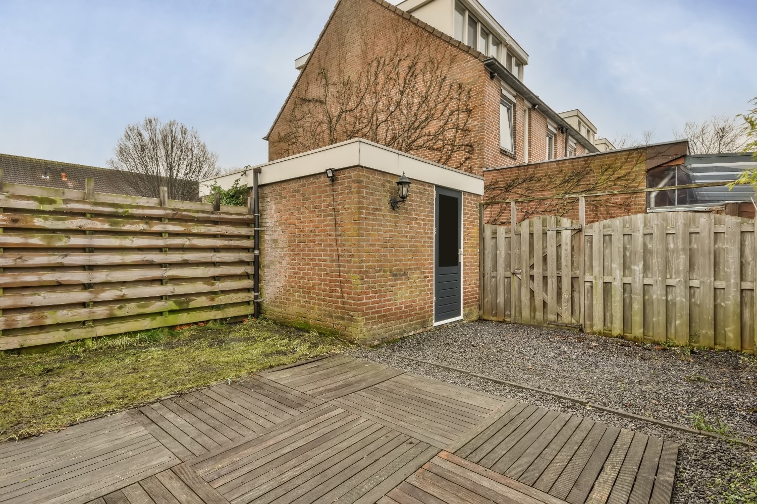 a-backyard-with-a-lawn-a-plant-bed-2025-02-10-05-38-21-utc (1)