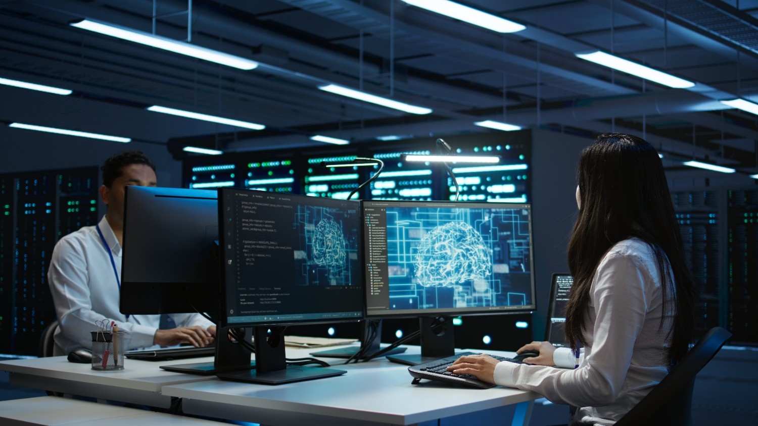 technicians-coworkers-using-ai-tech-on-computer-to-2025-02-20-03-23-37-utc (1)