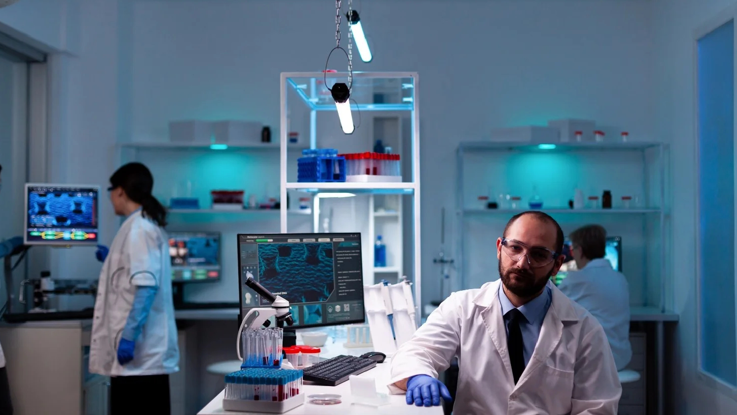 technicians-coworkers-using-ai-tech-on-computer-to-2025-02-20-03-23-37-utc-1